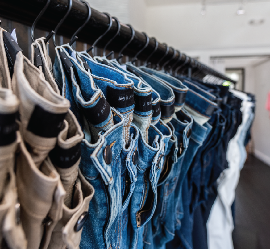 Denims on hangers.
